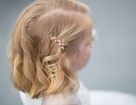 Large brass hair clip on little girl s hair 3167393